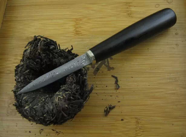 普洱茶饼与茶砖撬茶的方法技巧